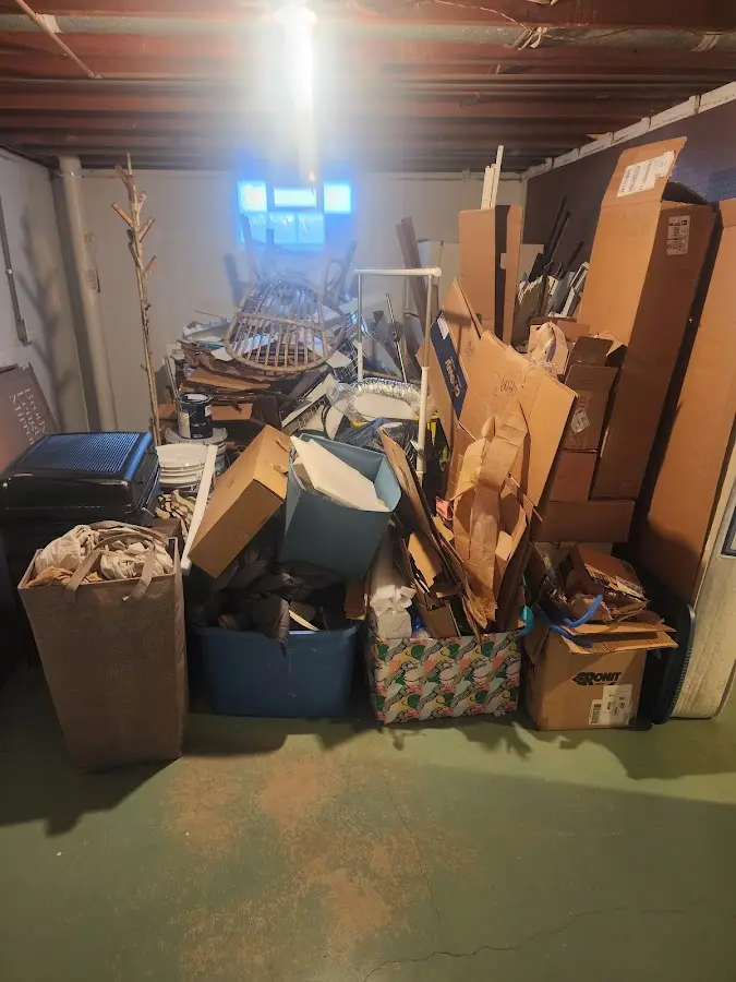 Roll-off dumpster container at job site for 6 Yard Dumpster Rental in Tullahoma